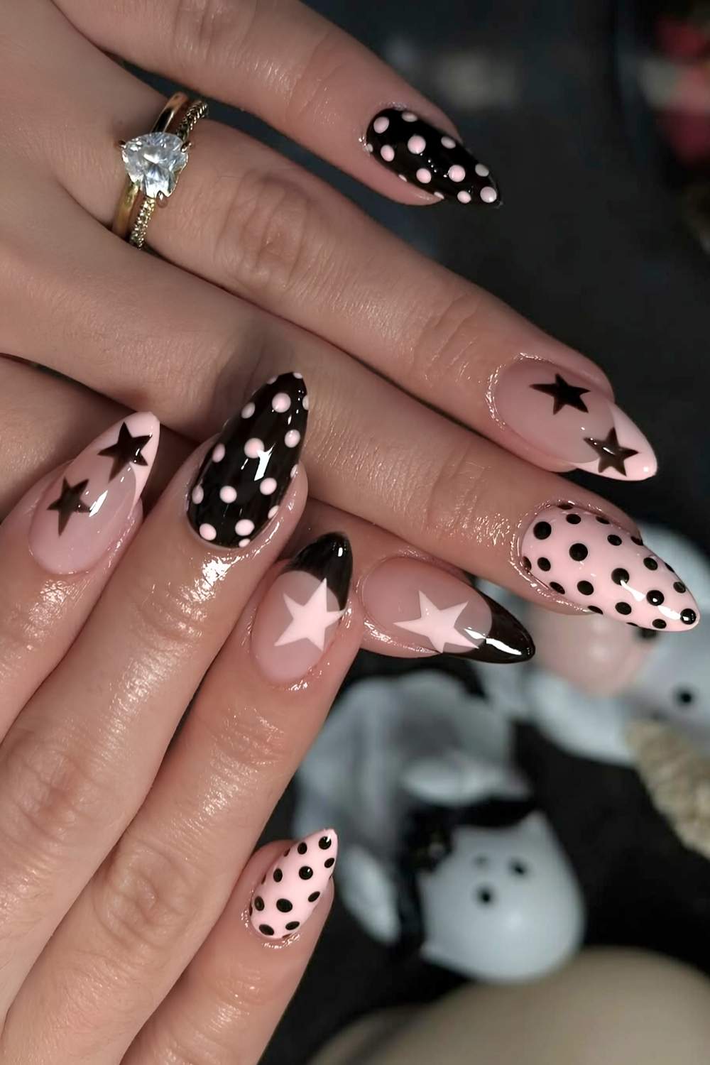 Black and pink nails with stars and dots
