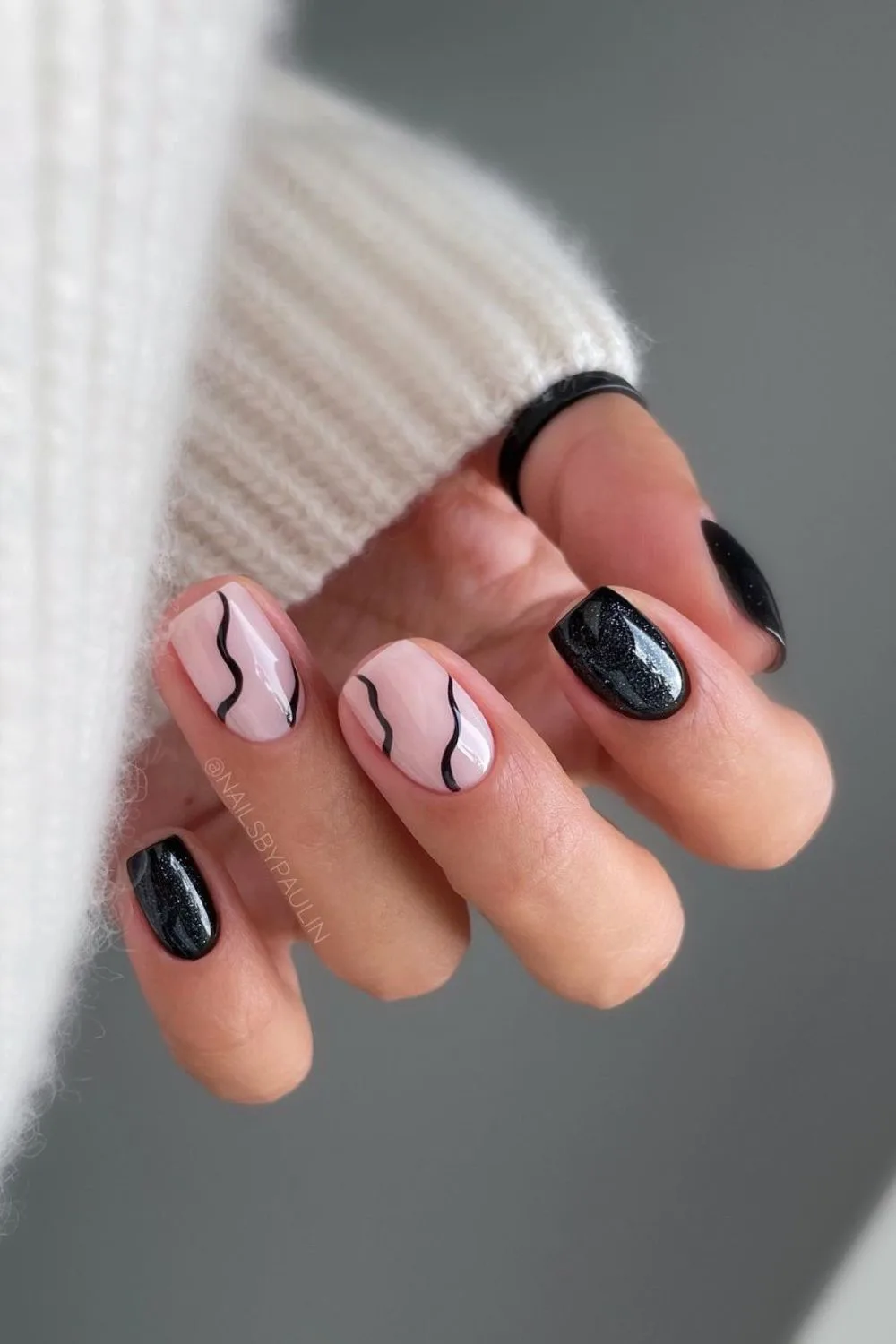 Black mani with accent swirls