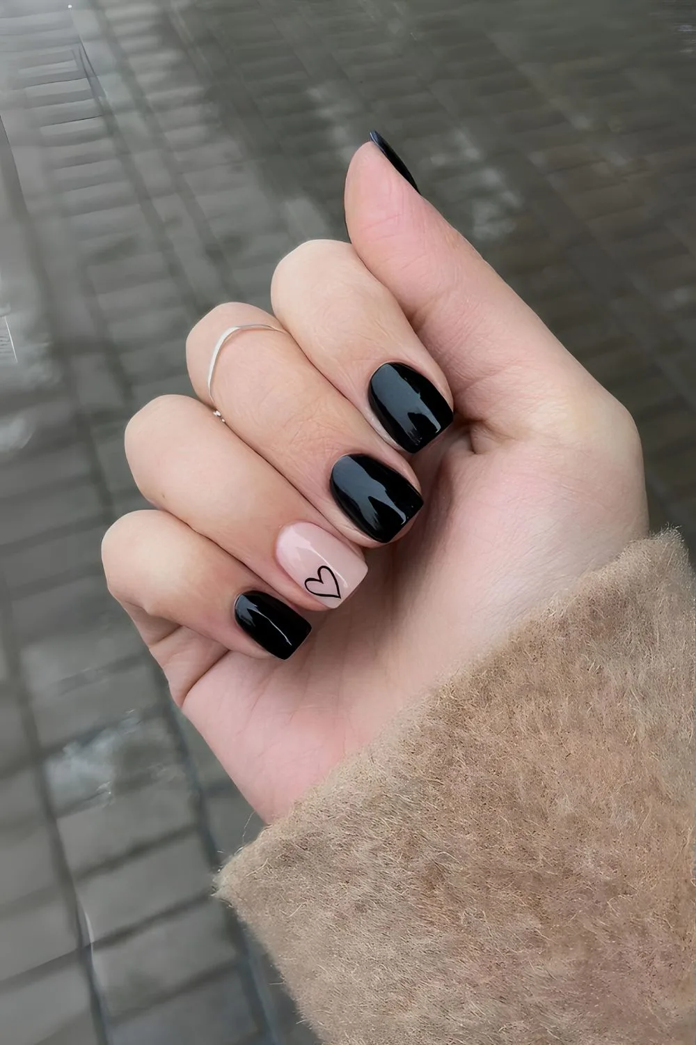 Black mani with delicate heart accent