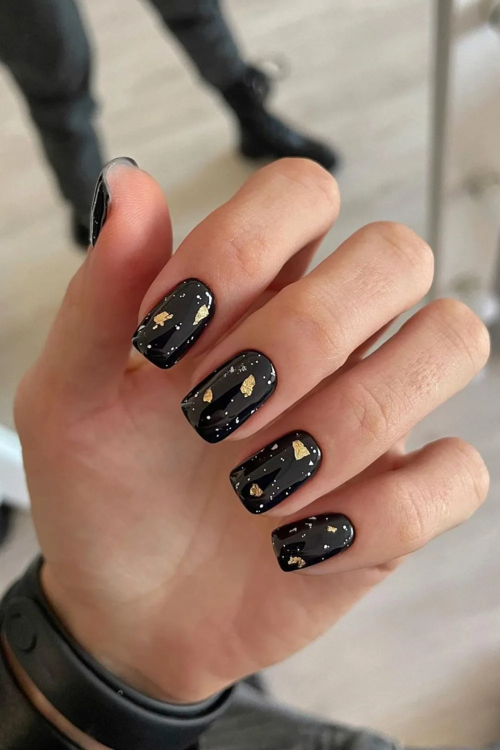 Black mani with gold foil accents