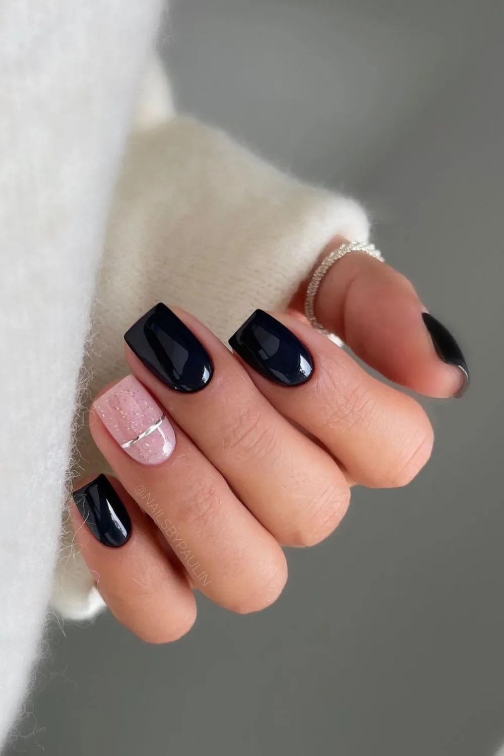 Black nails with accent silver chrome line