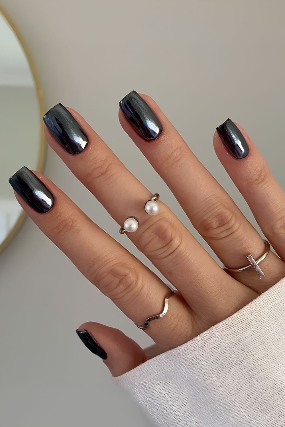 Black nails with chrome effect