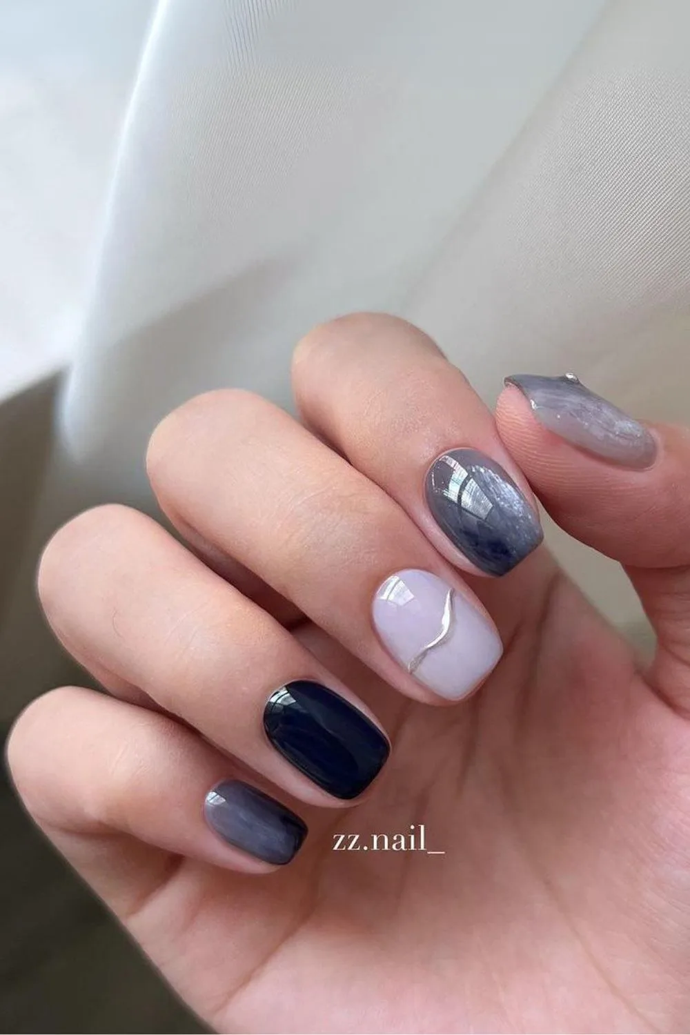 Blue and white jelly marble nails