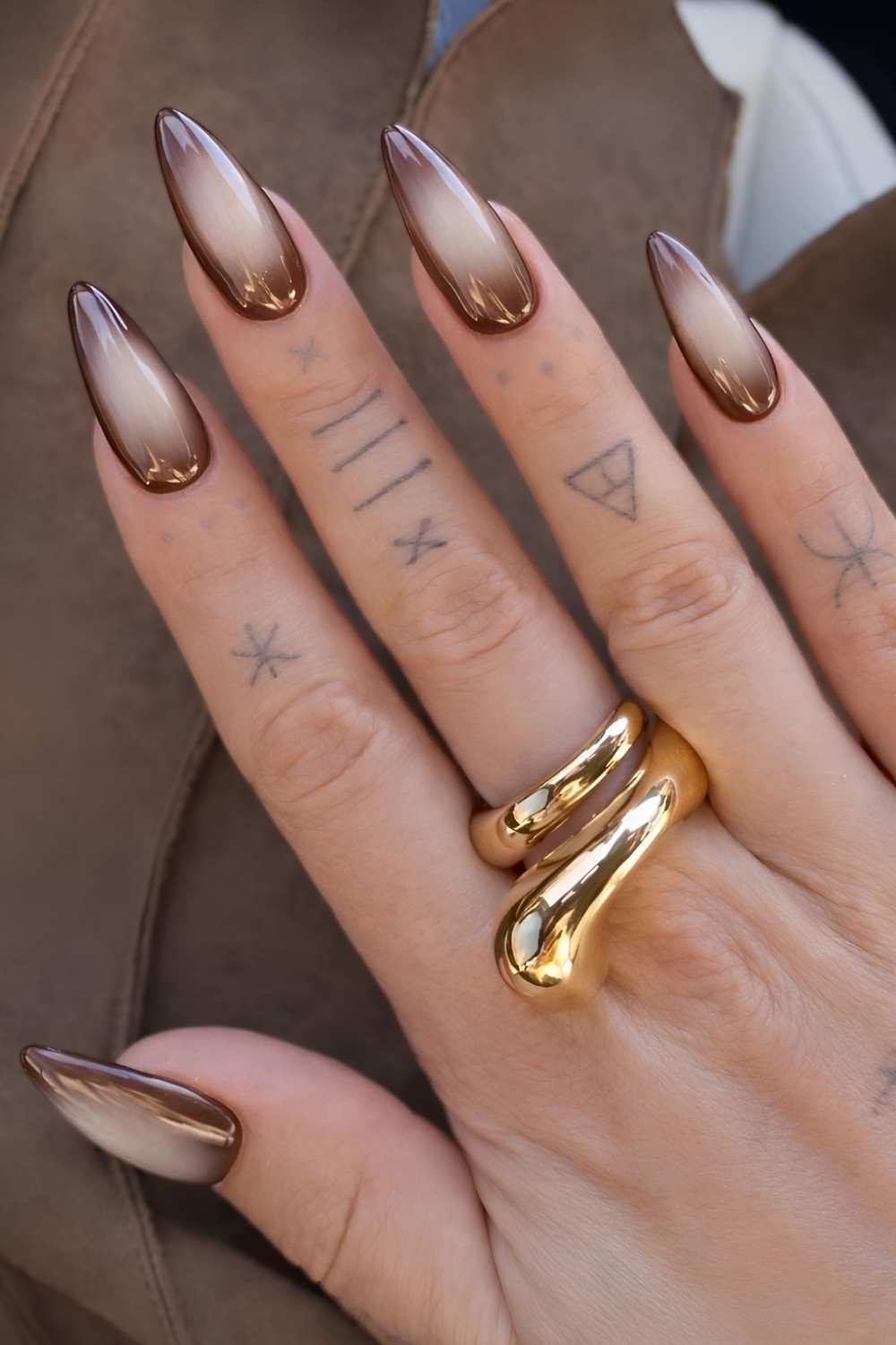 Brown and beige aura nails