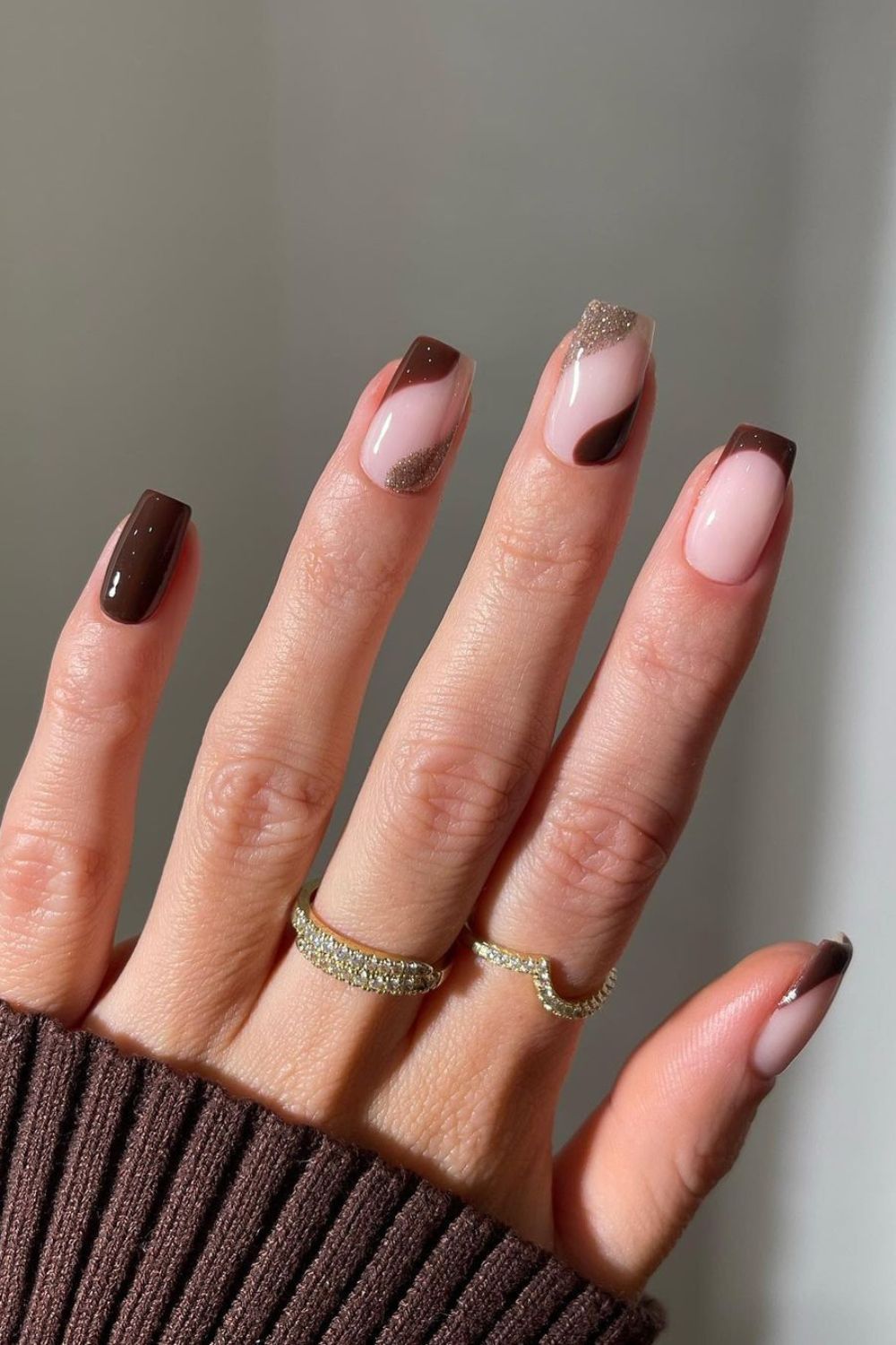 Brown and gold nails with negative space