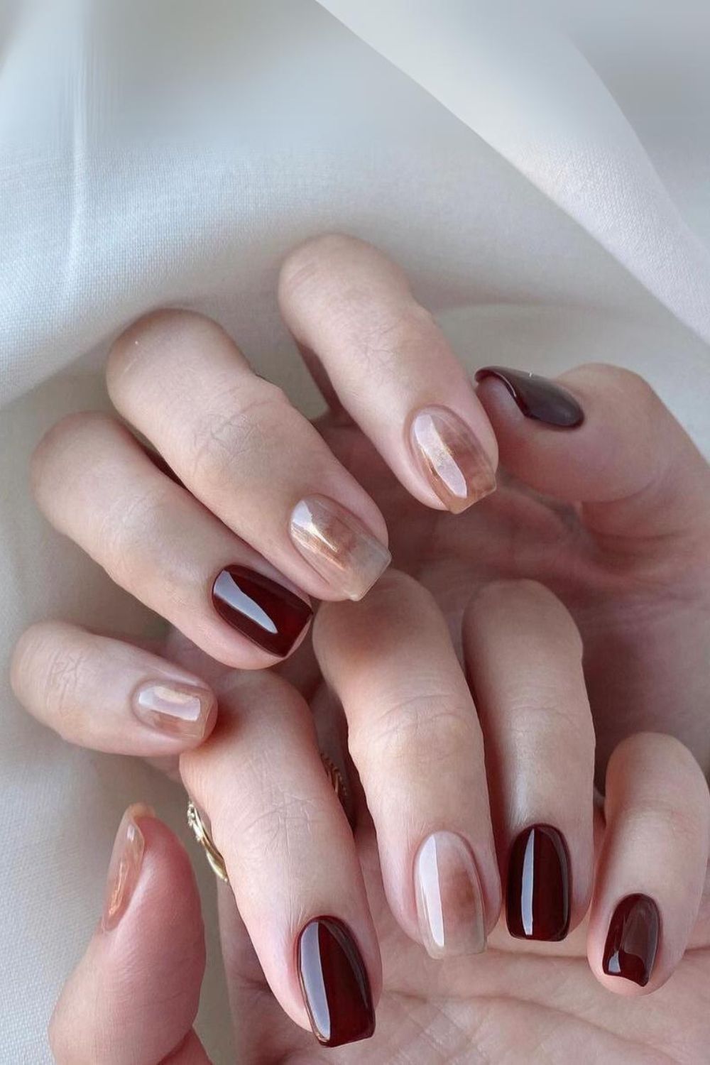 Brown nails with jelly marble accents