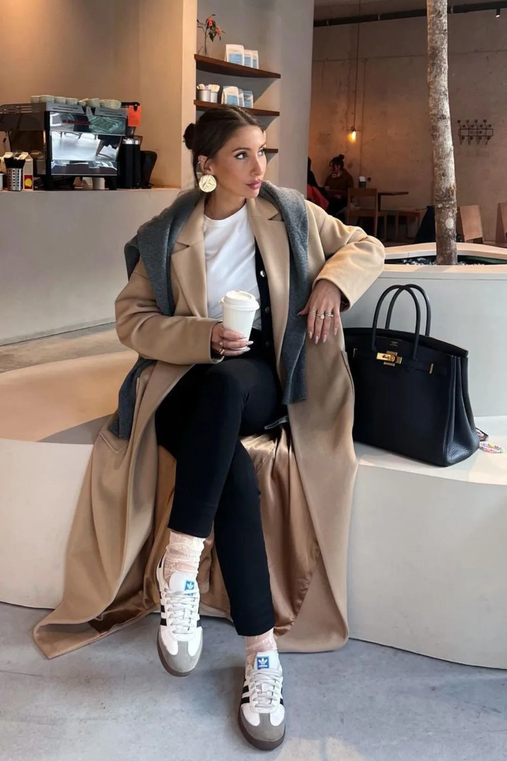 Camel Coat paired with black Leggings and sneakers