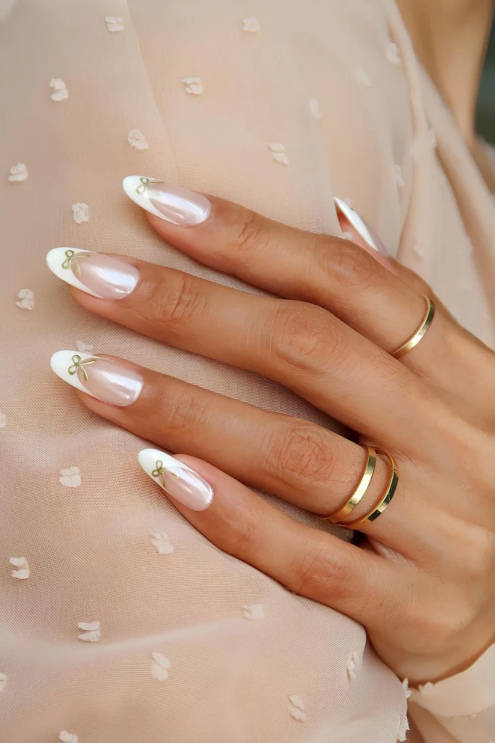 Chrome French tips with gold bows