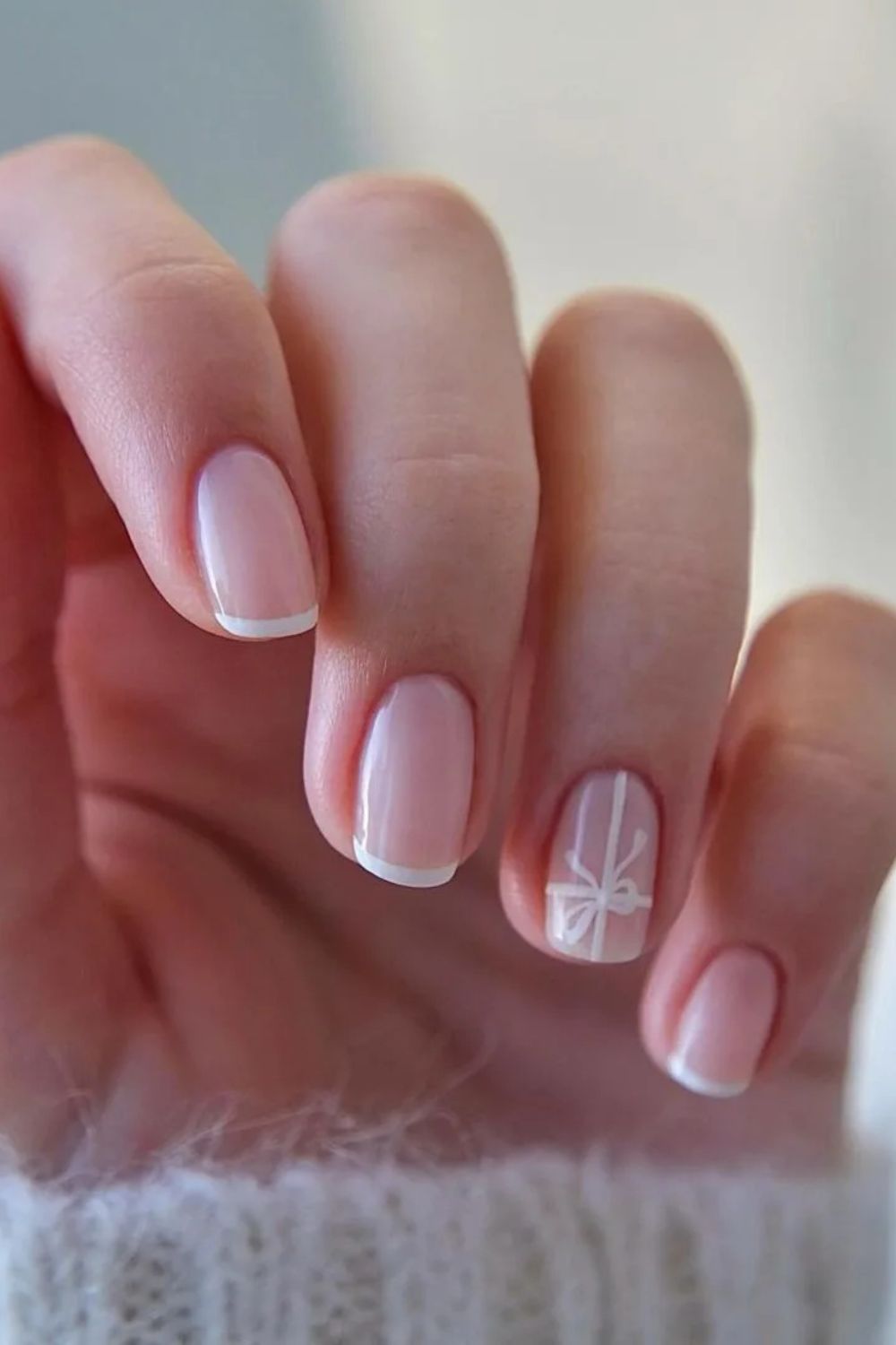 Classic white french tip nails with white ribbon