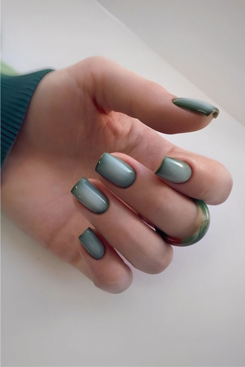 Dark and light green aura nails