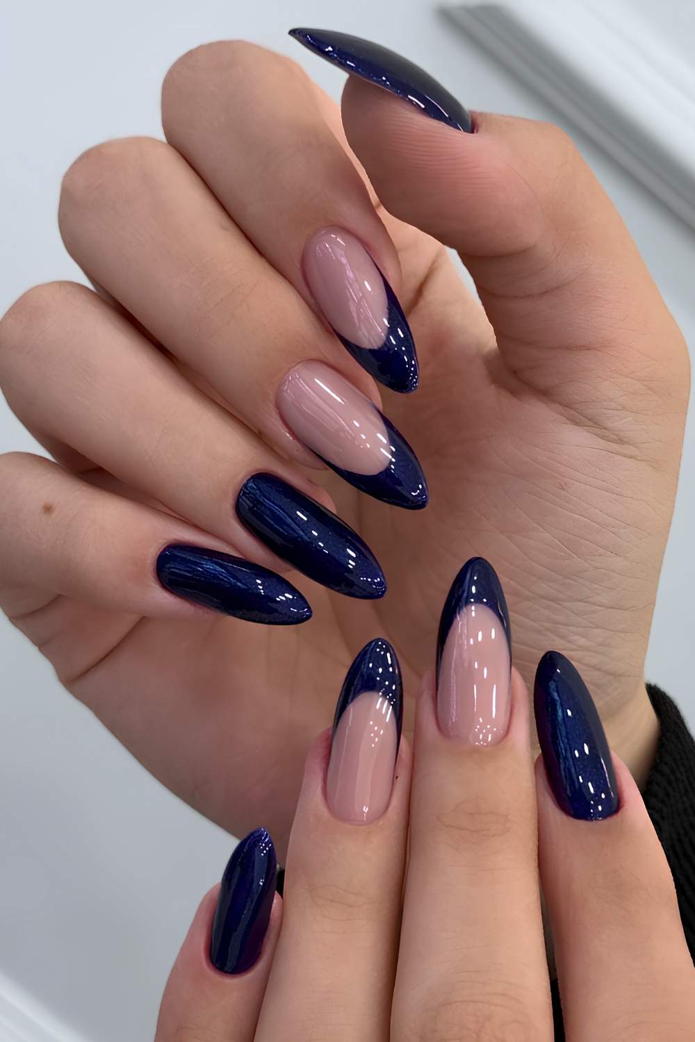 Dark blue manicure with accent French tips
