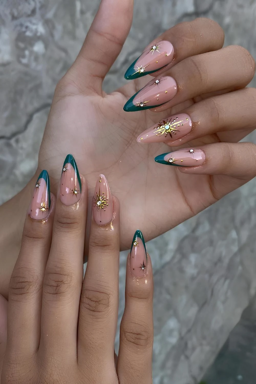 Dark green French nails with gold stars