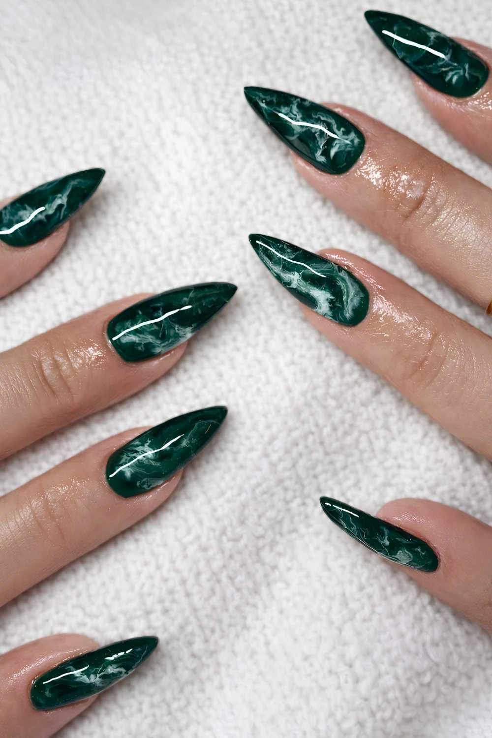 Dark green and white marble nails