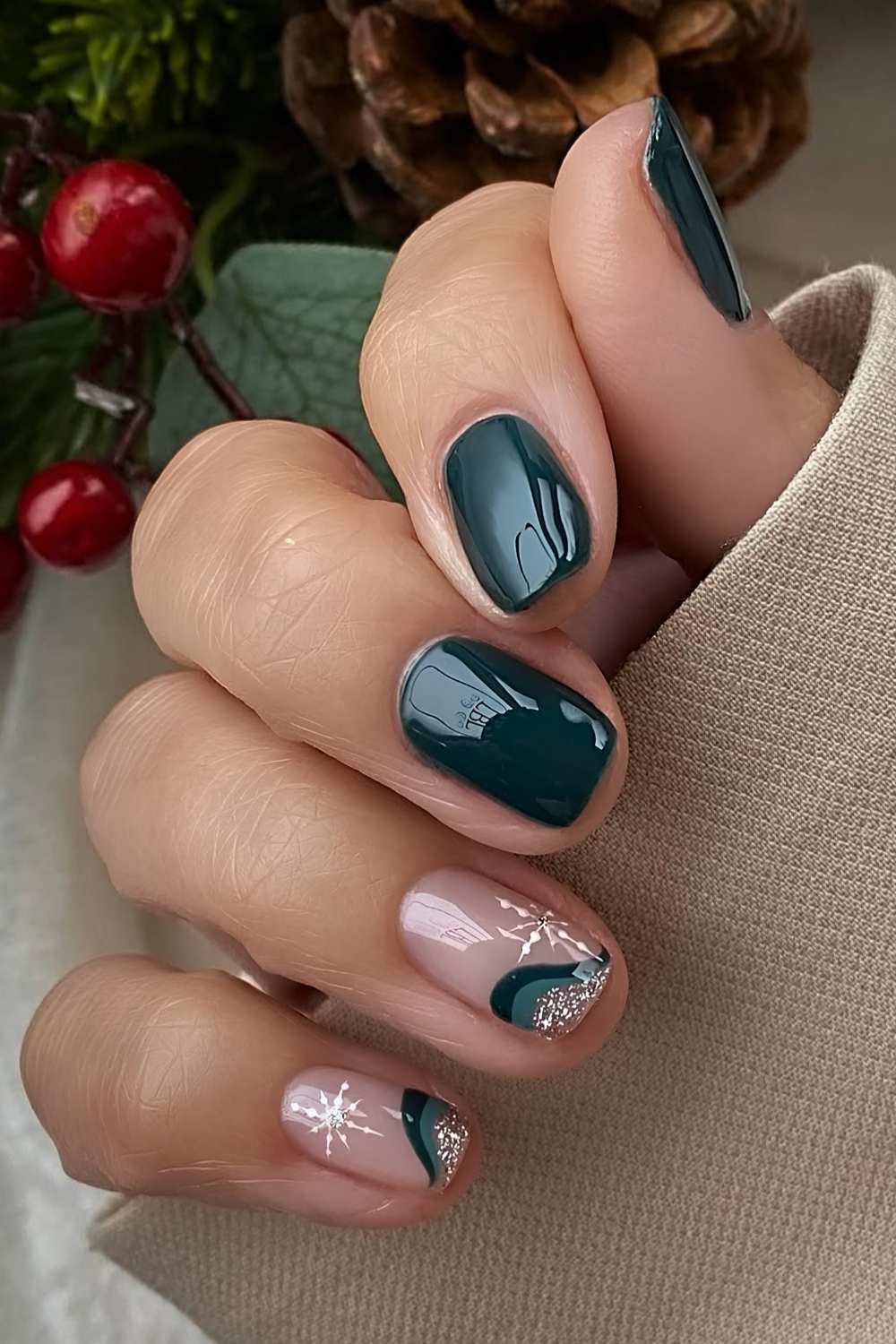 Dark green nails with snowflake art