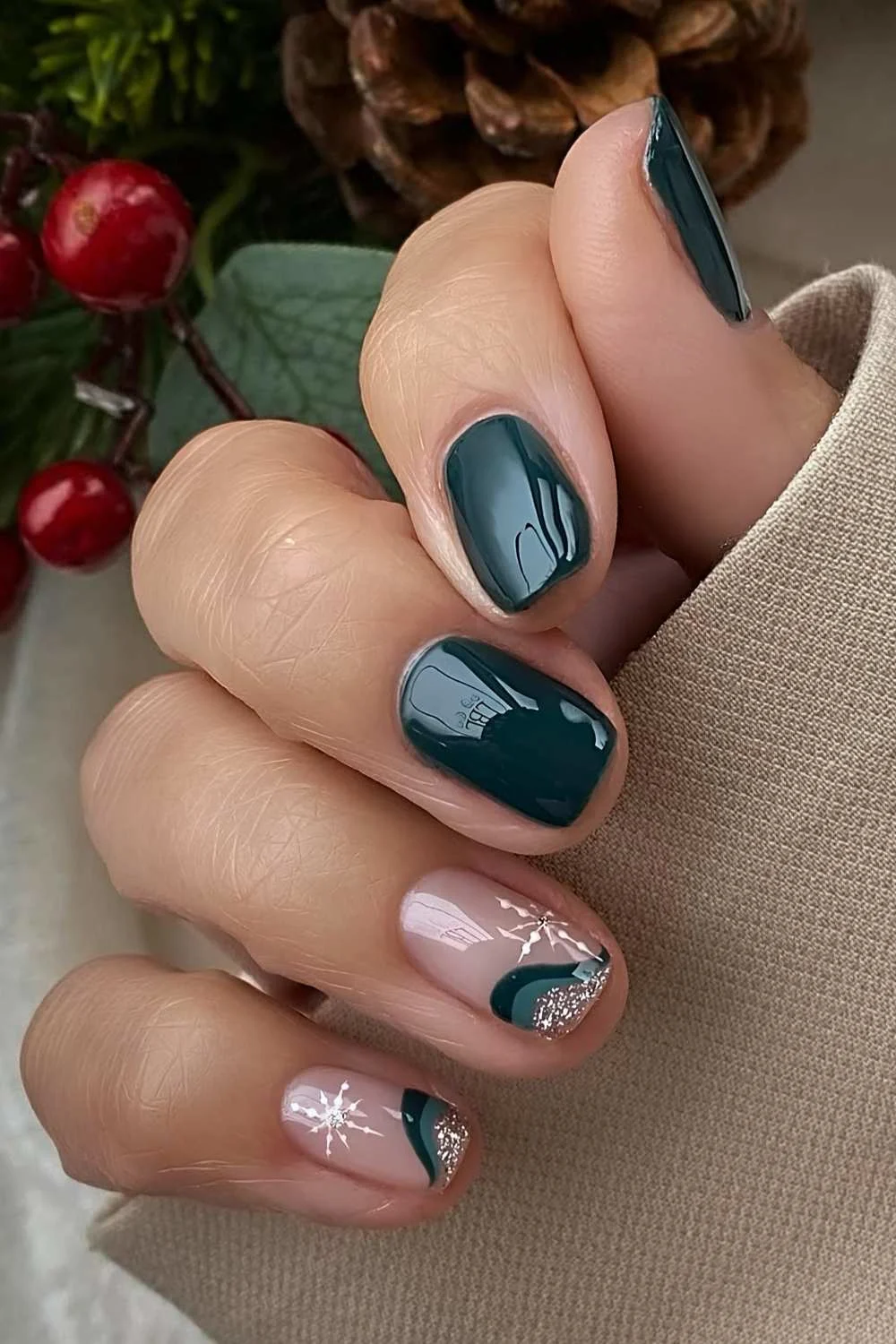 Dark green nails with snowflake art