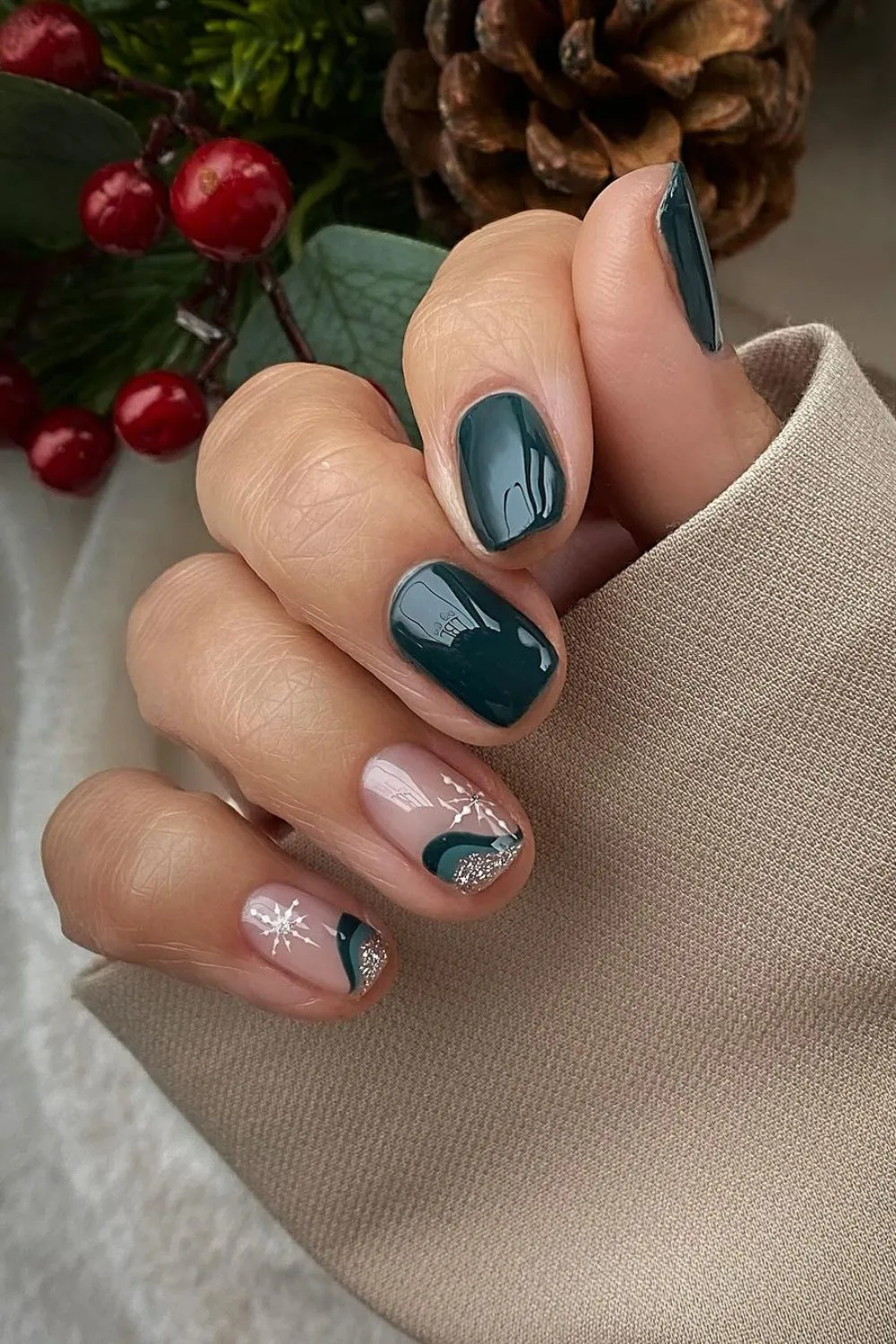 Dark green nails with snowflakes