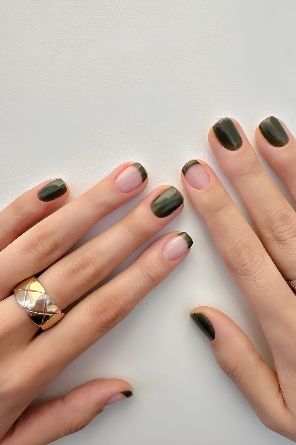 Dark green solid and french tip nails