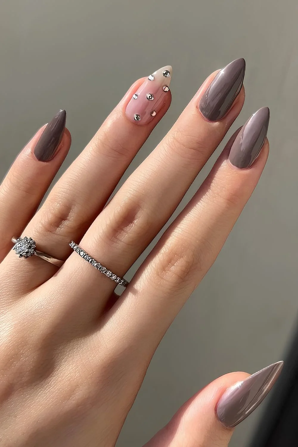 Dark greige nails with rhinestones