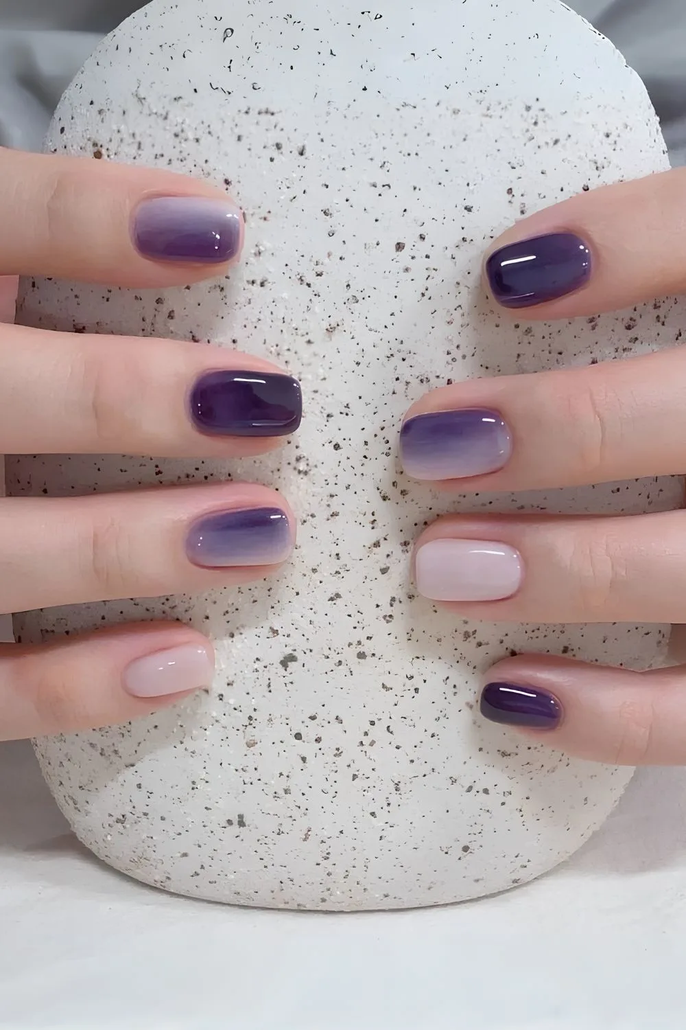 Dark purple and soft pink gradient nails