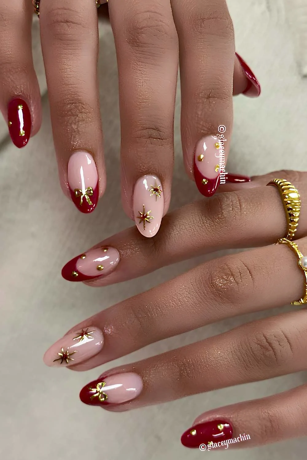 Dark red nails with festive celestial art