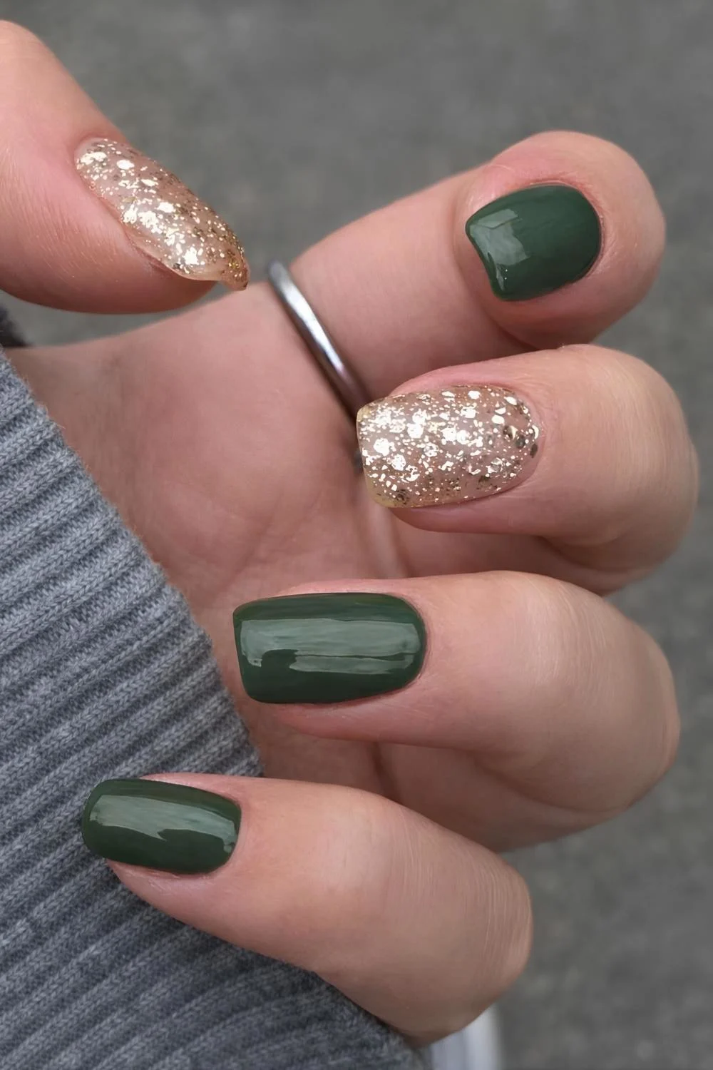 Deep olive nails with gold glitter