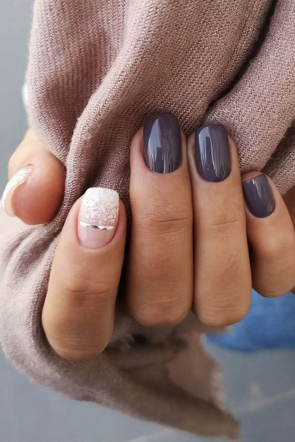 Dusty purple nails with snow-effect accents