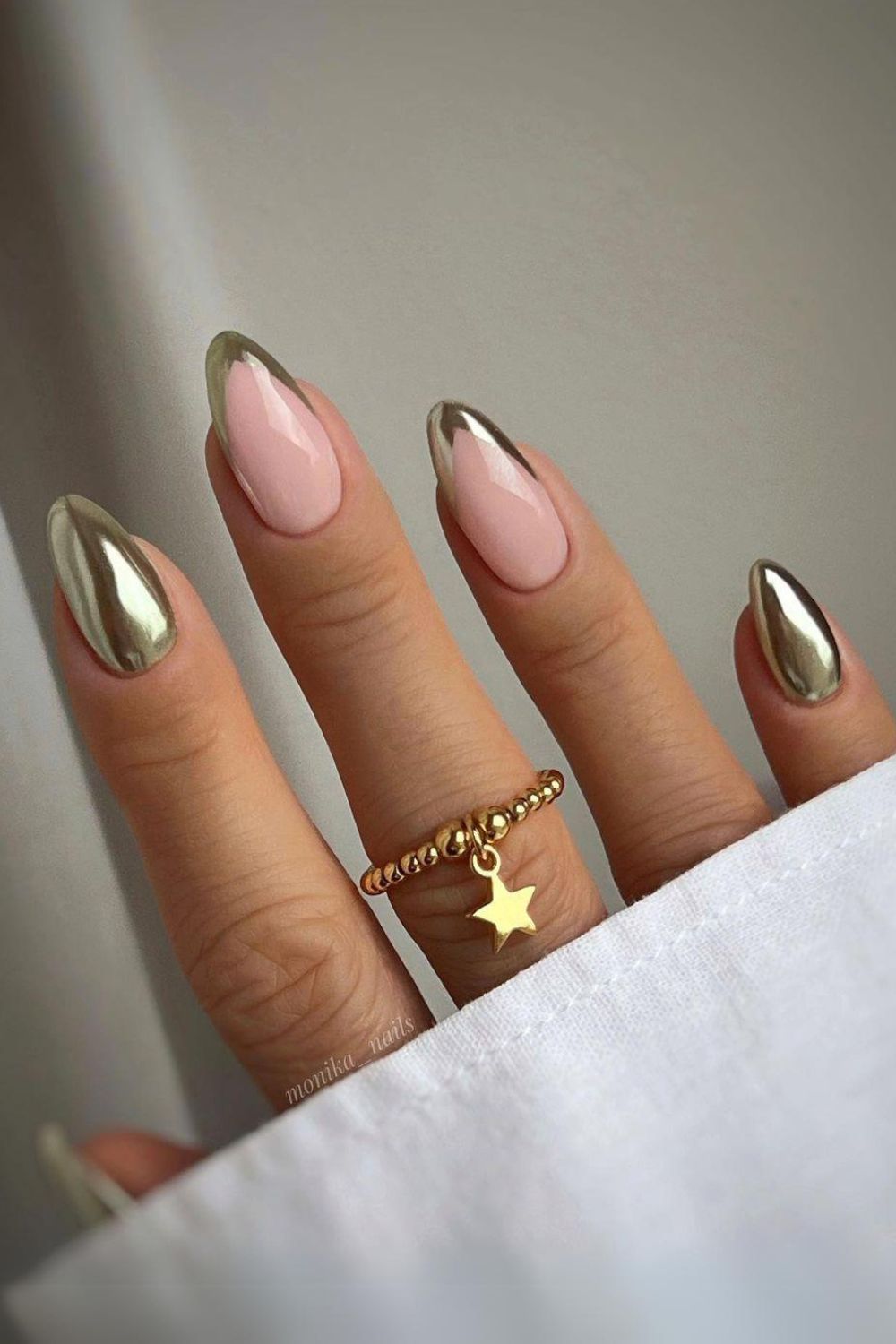 Elegand gold chrome nails