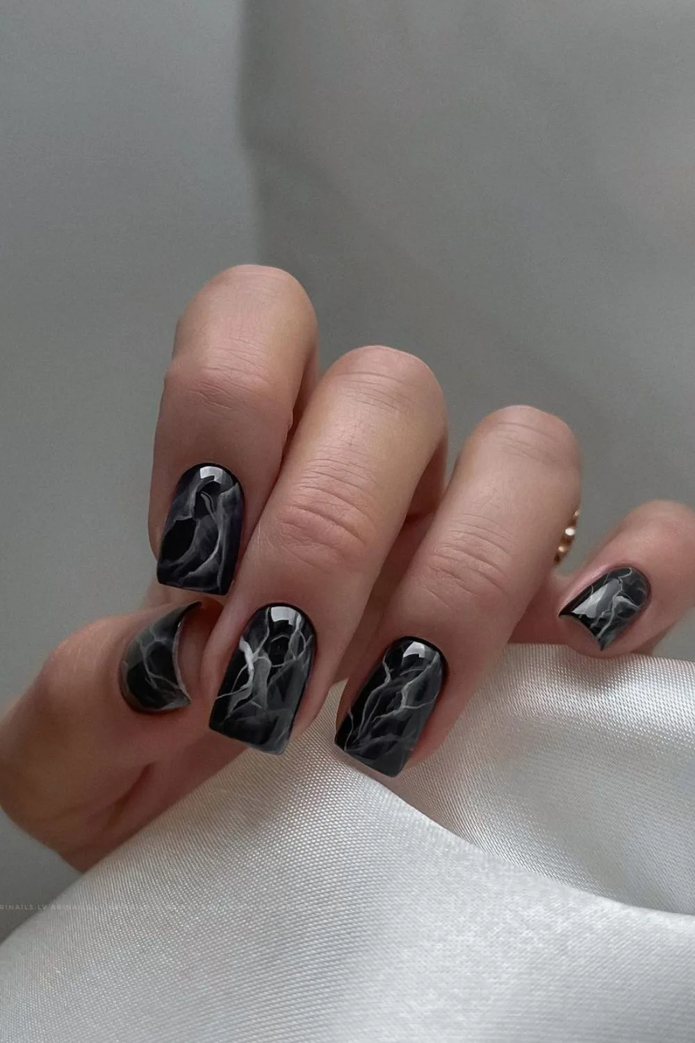 Elegant black marble nails