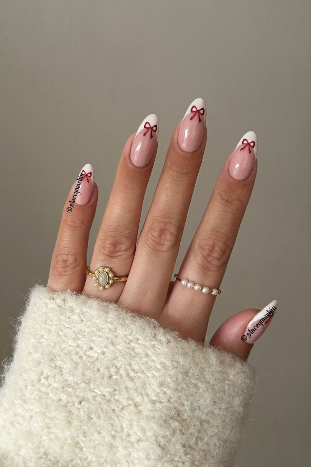 French tip nails with red bows