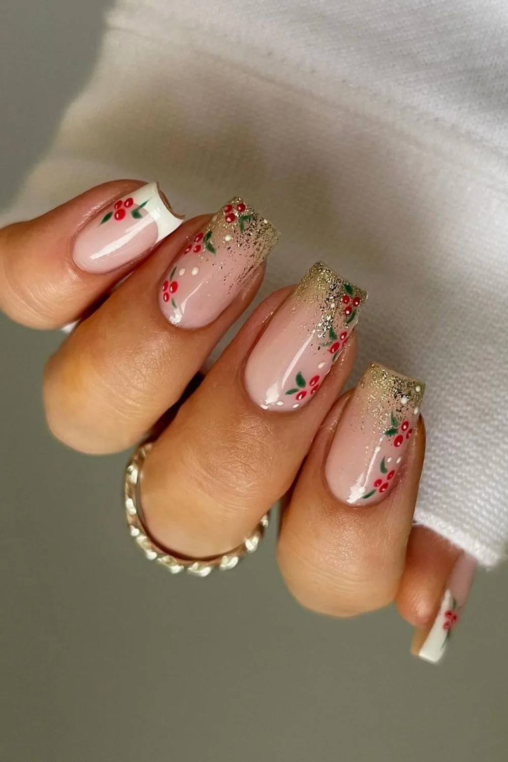 Glitter french tip nails with mistletoe