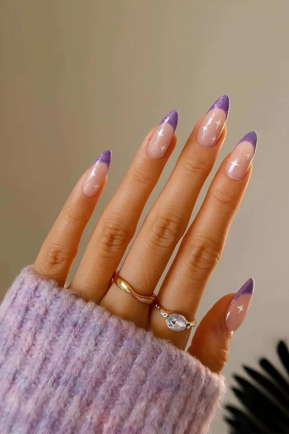 Glittery purple French tips with celestial accents