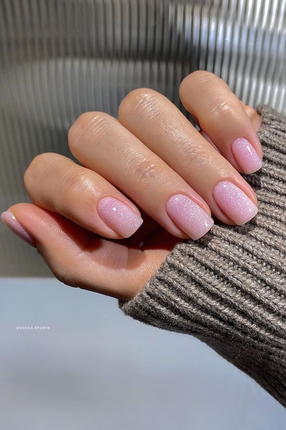 Glittery soft pink nails