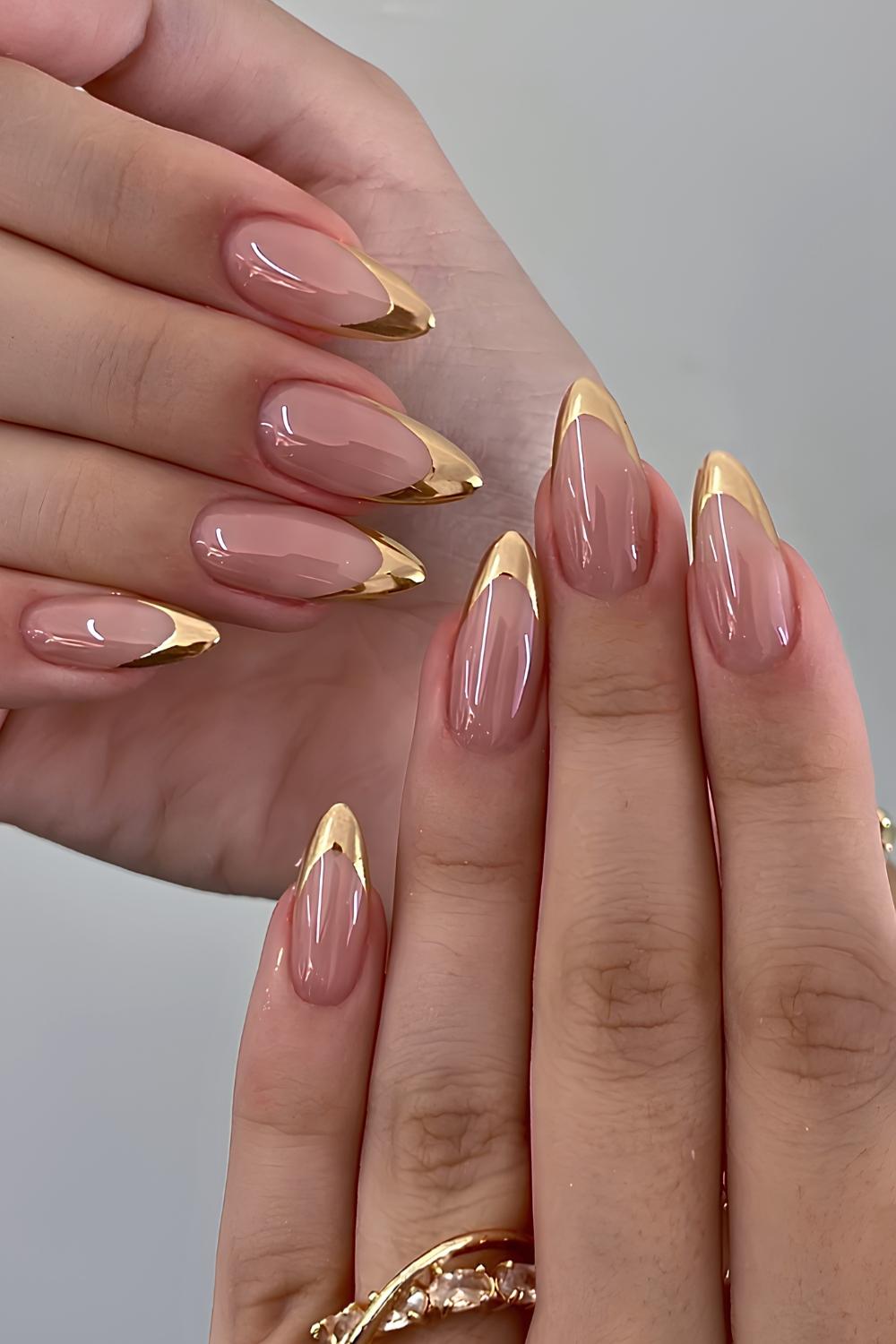 Glossy gold French manicure