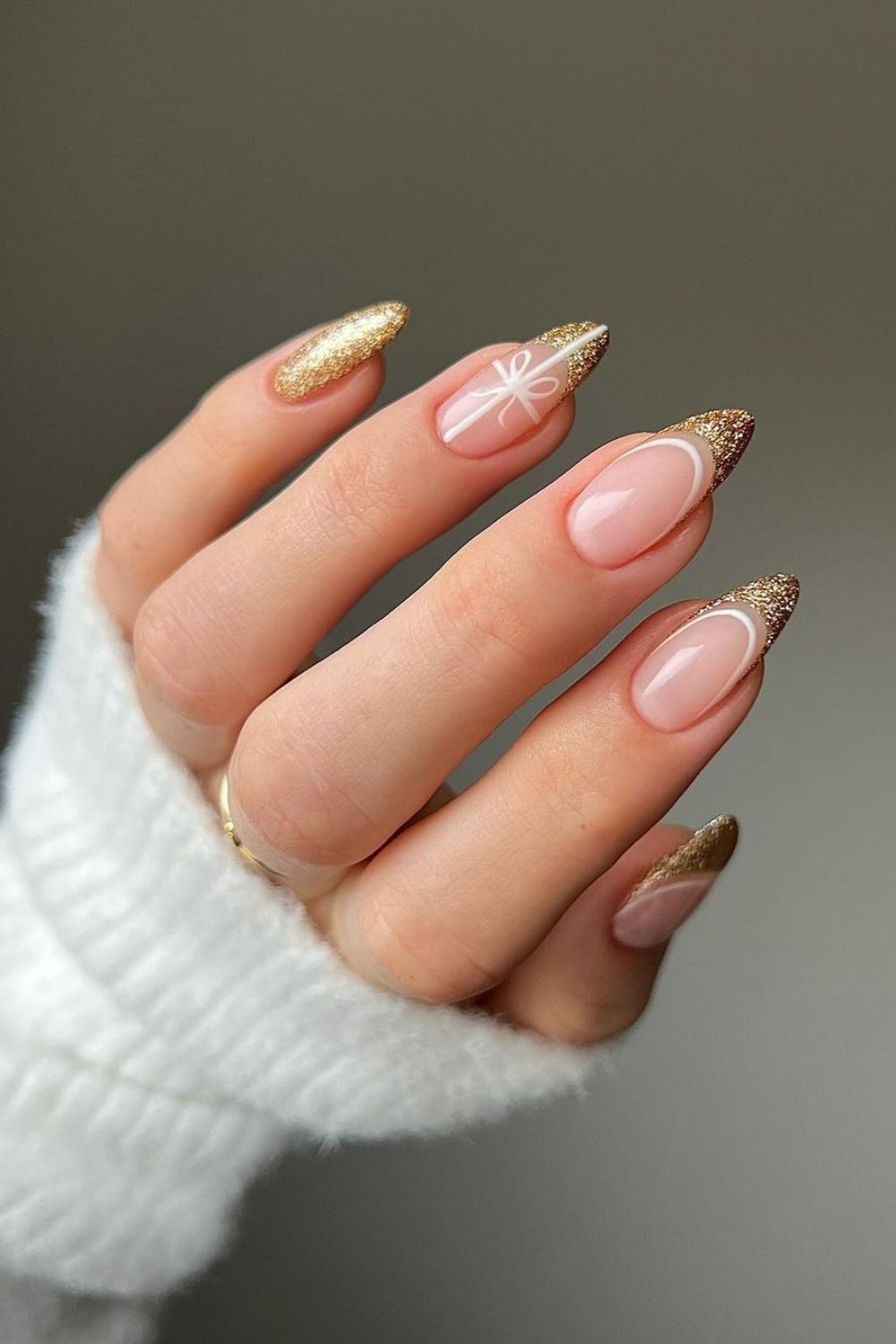 Gold Glitter double french tip nails with bow