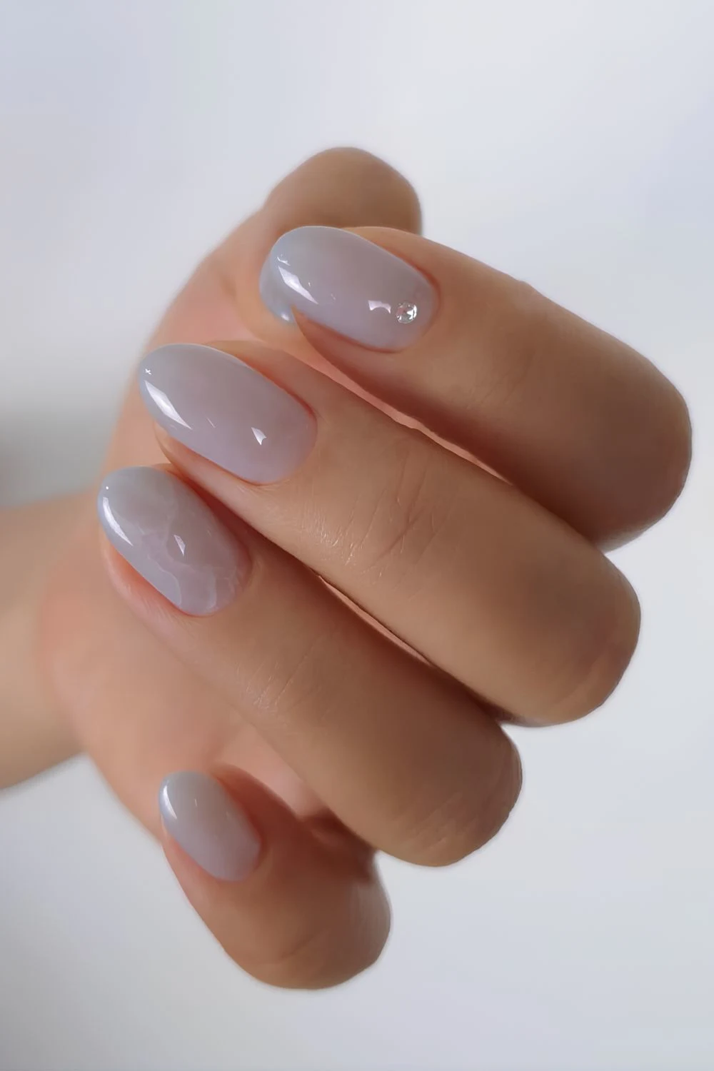 Gray jelly nails with marble accent