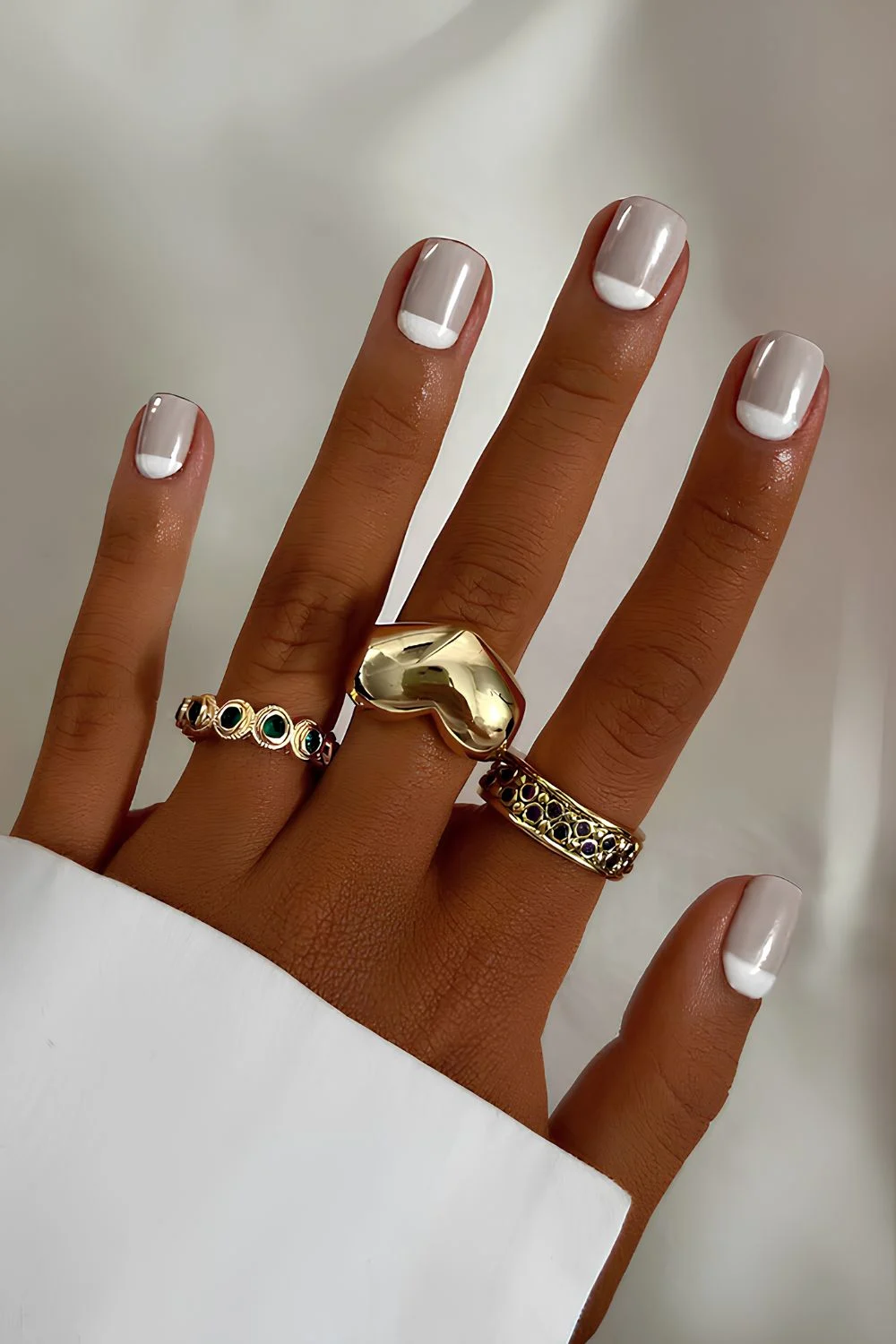 Gray mani with white half-moon accents