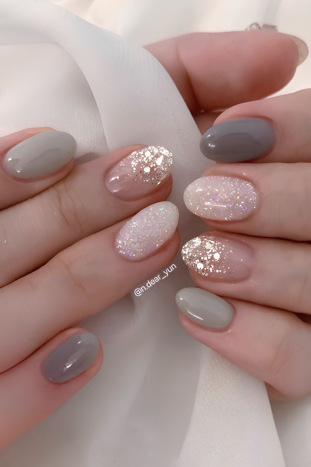 Gray manicure with accent glitter