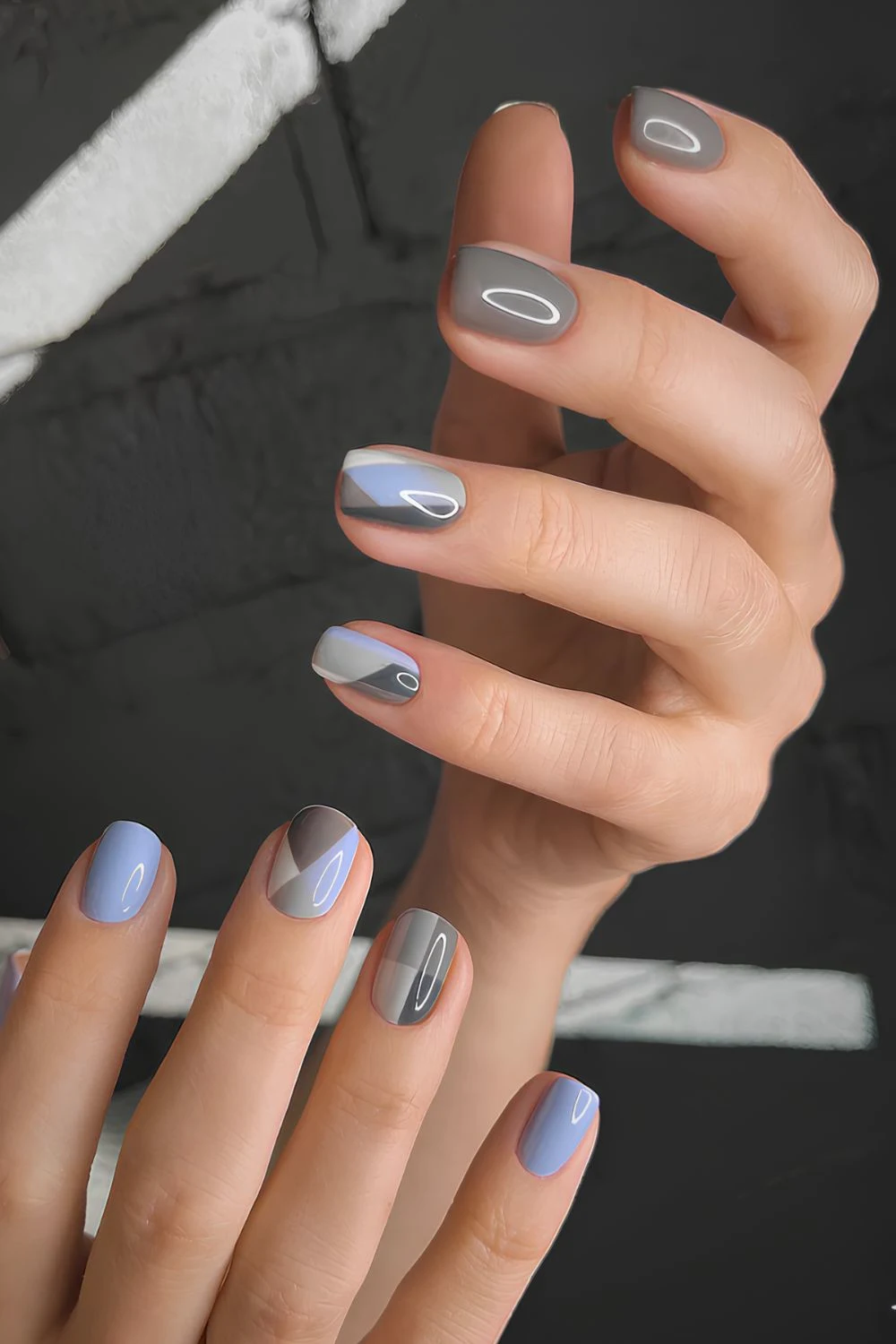 Gray nails with blue accents