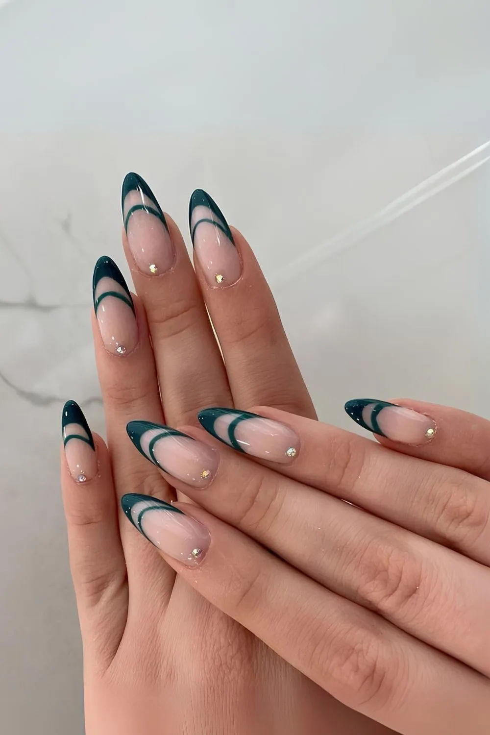 Green double French tip nails with rihinestones