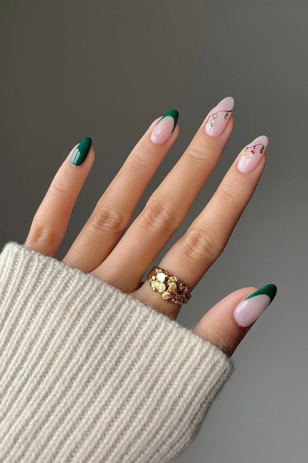 Green french tip nails with christmas lights