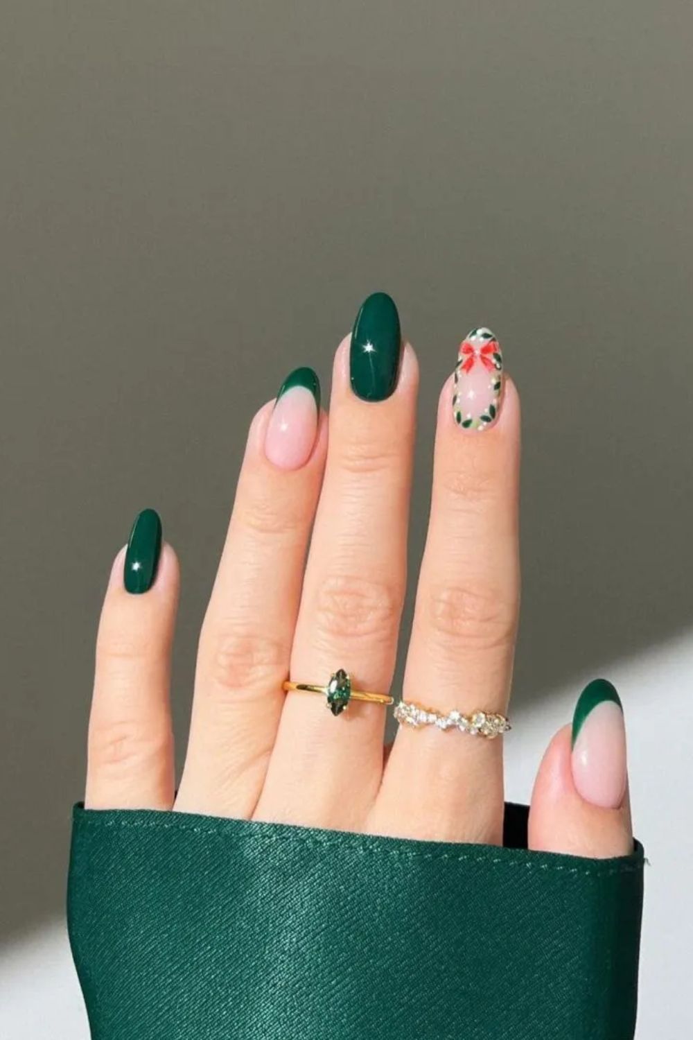 Green french tip nails with christmas wrenth accent