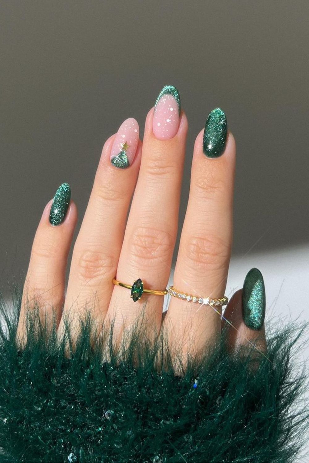 Green velvet nails with Christmas tree accent on one nail