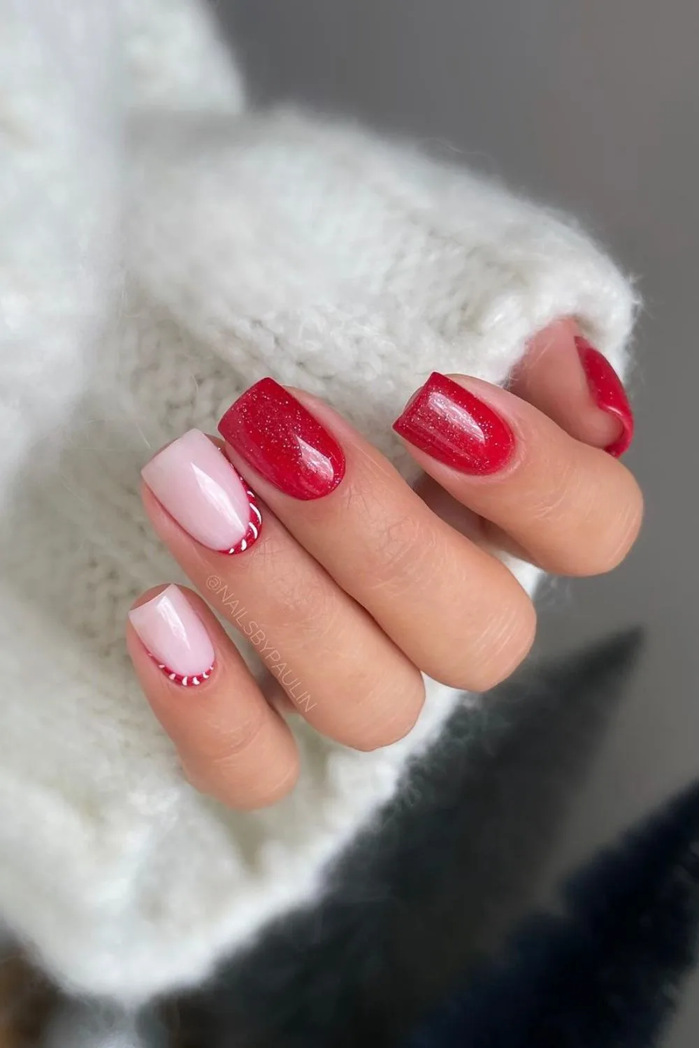 Inverted French tip nails with candy cane accent