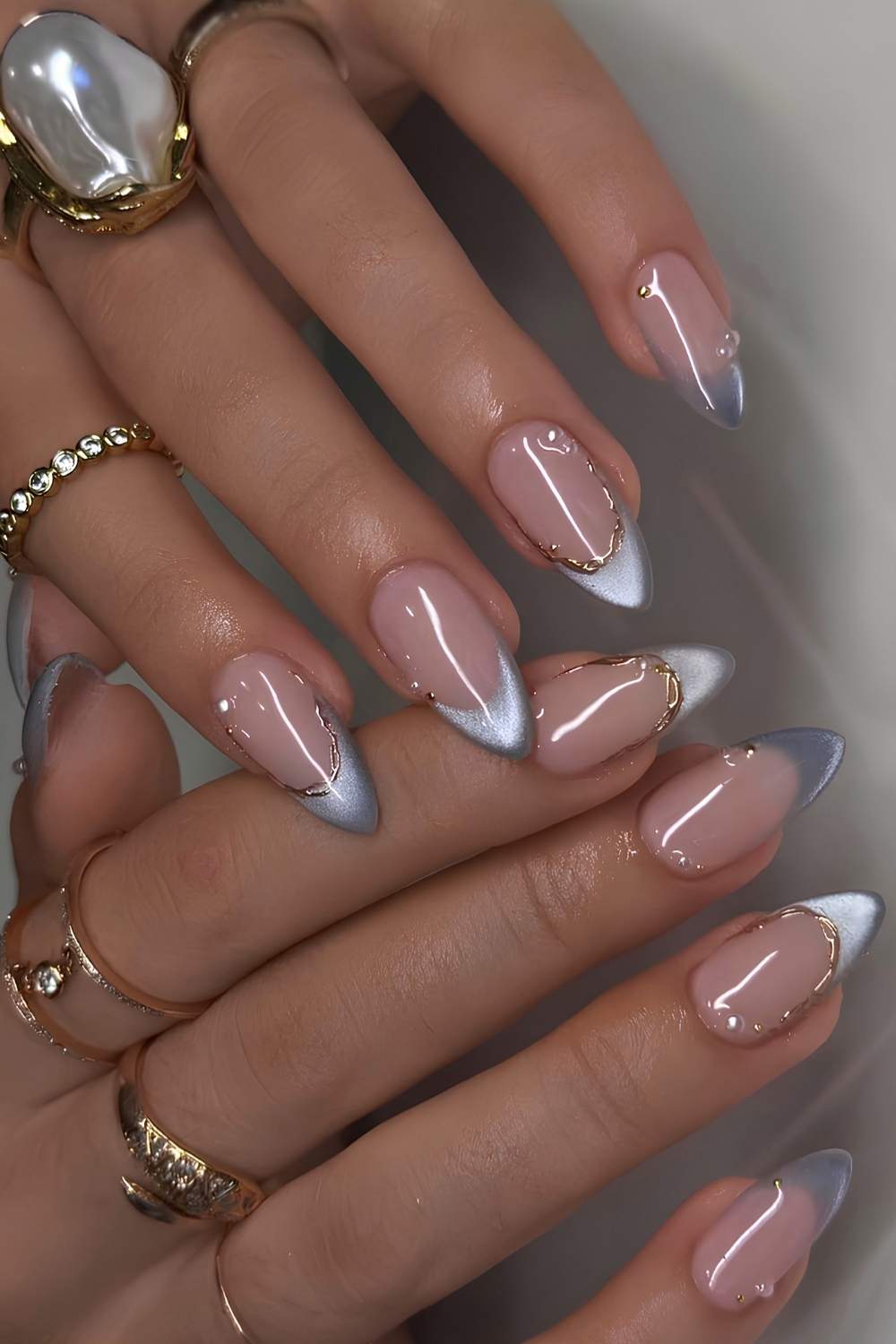 Light blue cat eye French nails
