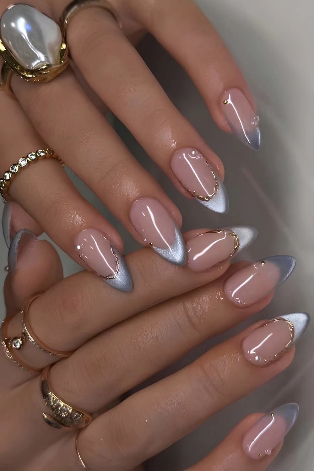 Light blue cat eye French nails