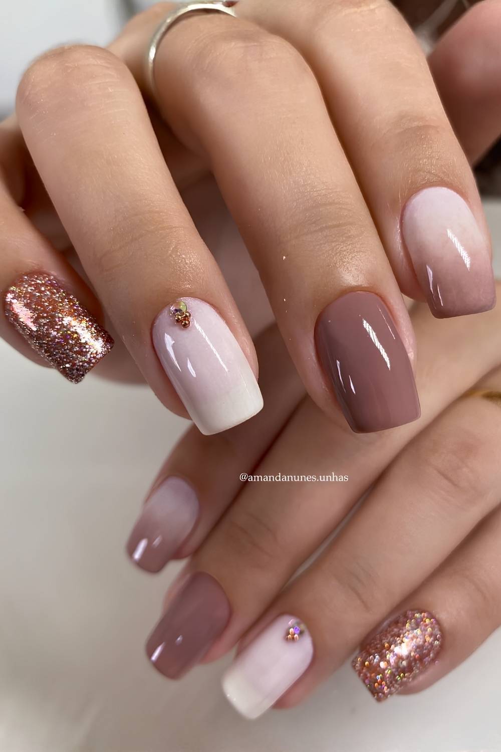 Light brown and white nails with glitter