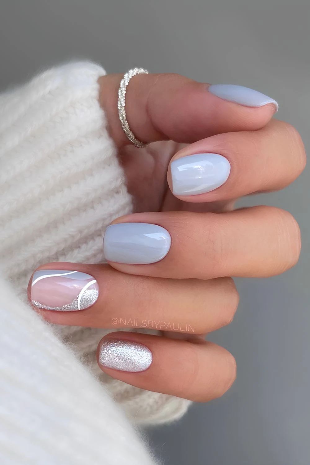 Light gray mani with glitter