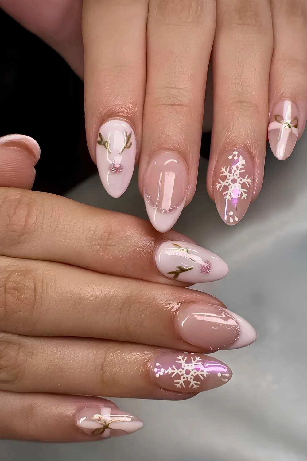 Light pink nails with Rudolph art accents