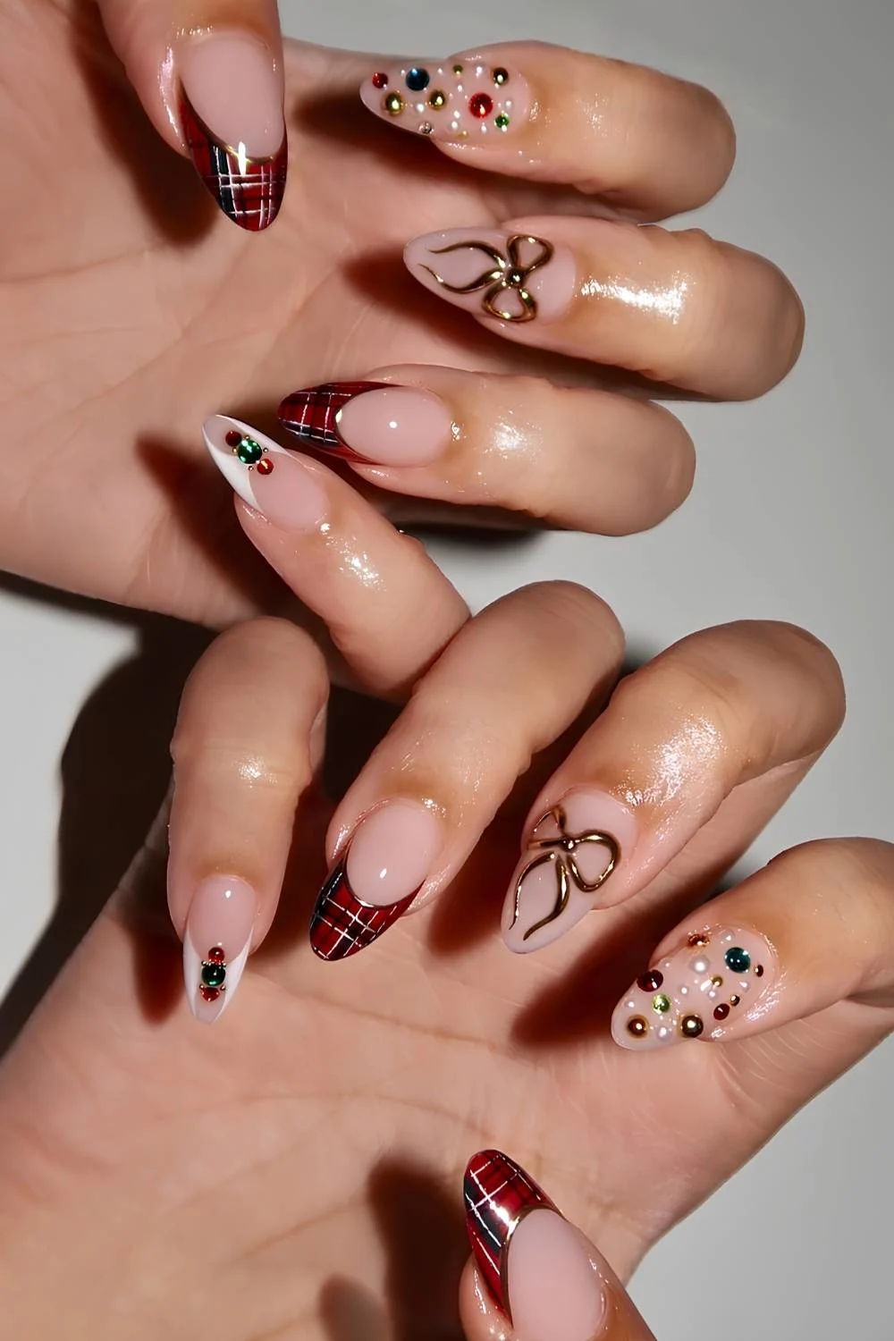Mismatched Christmas French nails with plaid and bows
