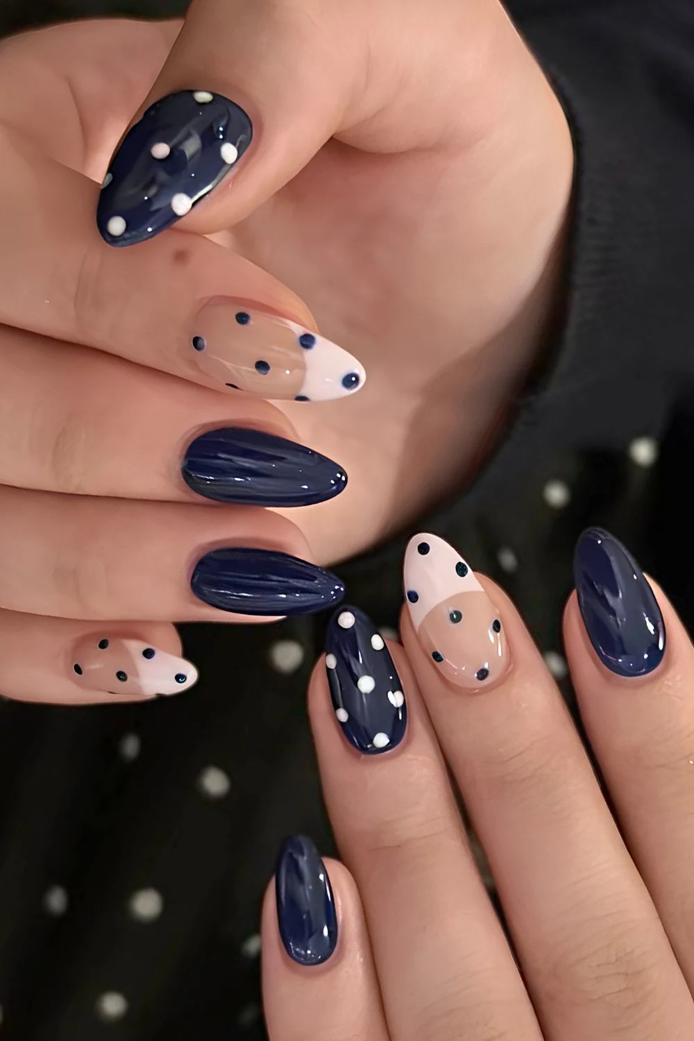 Navy blue and white polka dot manicure